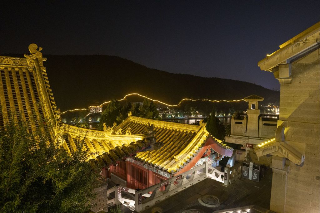 Miniature of Longmen Binyang Central Cave, night view